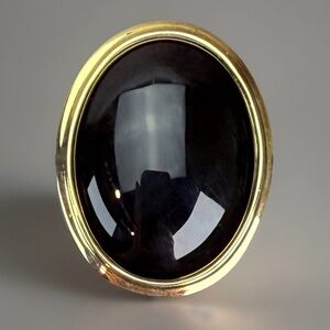 Vintage Weighted Black and Goldtone Oval Brooch